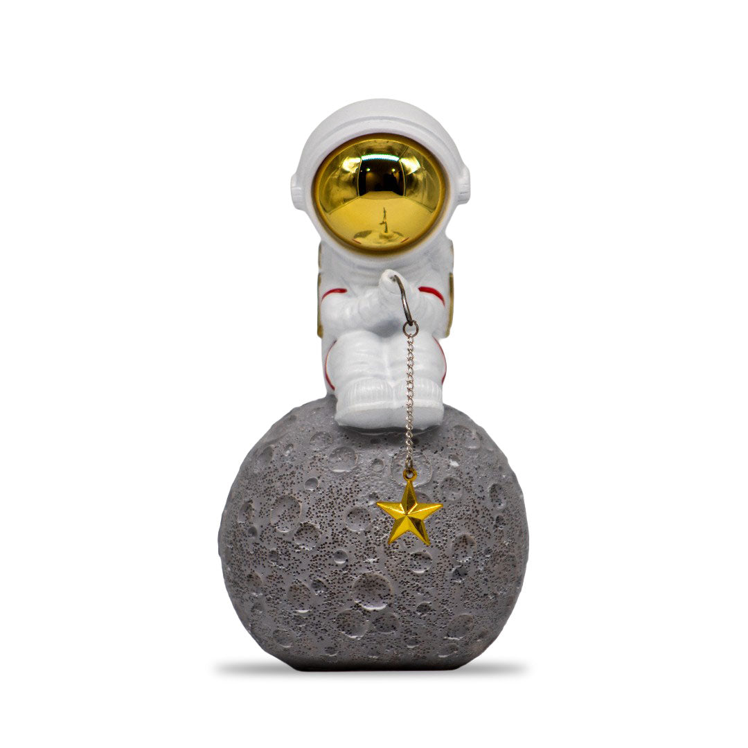 Figura Decorativa de Poliresina Astronauta Pescando Estrellas 17 cm