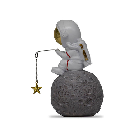 Figura Decorativa de Poliresina Astronauta Pescando Estrellas 17 cm