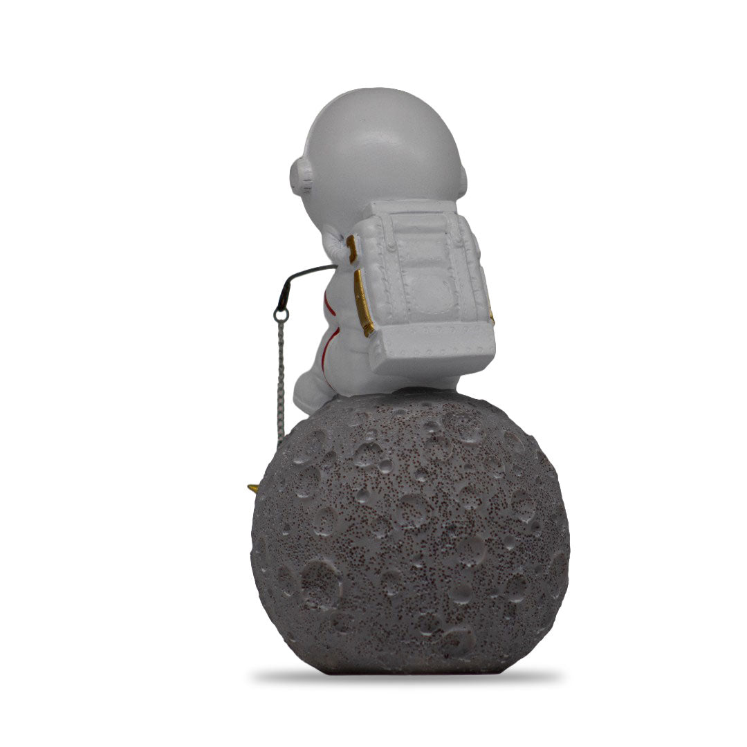Figura Decorativa de Poliresina Astronauta Pescando Estrellas 17 cm