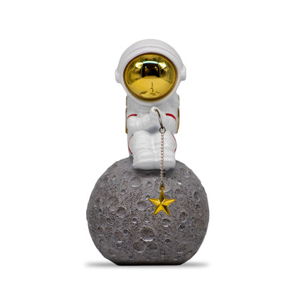 Figura Decorativa de Poliresina Astronauta Pescando Estrellas 17 cm