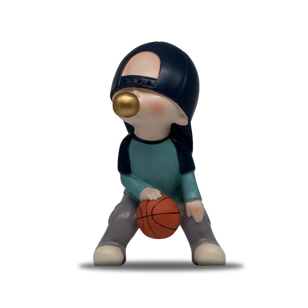 Figura De Poliresina Niño Con Chicle Azul Basquetbol 23 Cm